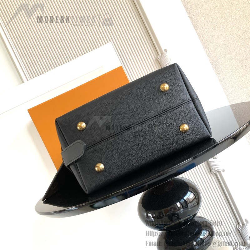 Louis Vuitton Low Key Hobo Bag in grained calfskin leather with adjustable shoulder strap