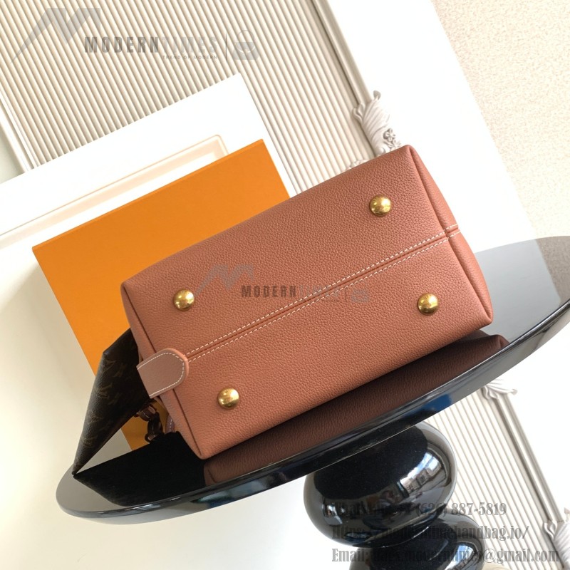 Louis Vuitton Low Key Hobo Bag in grained calfskin leather with adjustable shoulder strap