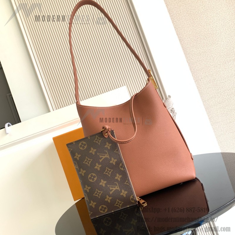 Louis Vuitton Low Key Hobo Bag in grained calfskin leather with adjustable shoulder strap