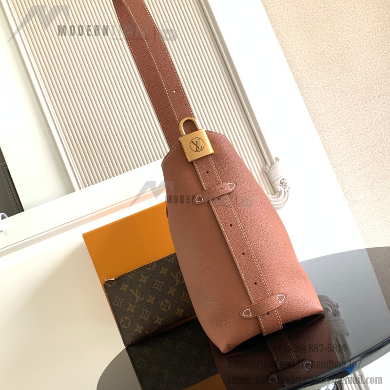 Louis Vuitton Low Key Hobo Bag in grained calfskin leather with adjustable shoulder strap