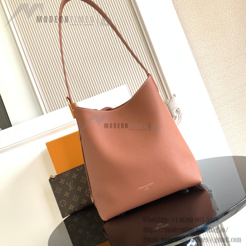 Louis Vuitton Low Key Hobo Bag in grained calfskin leather with adjustable shoulder strap
