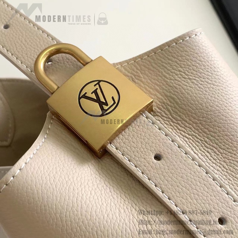 Louis Vuitton Low Key Hobo Bag in grained calfskin leather with adjustable shoulder strap