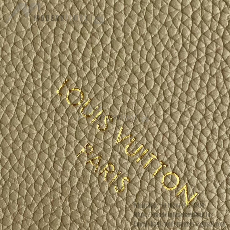 Louis Vuitton Low Key Hobo Bag in grained calfskin leather with adjustable shoulder strap