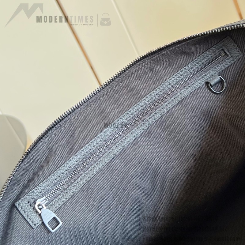 Louis Vuitton Keepall Bandoulière 45 travel bag in Monogram Midnight coated canvas with leather trim