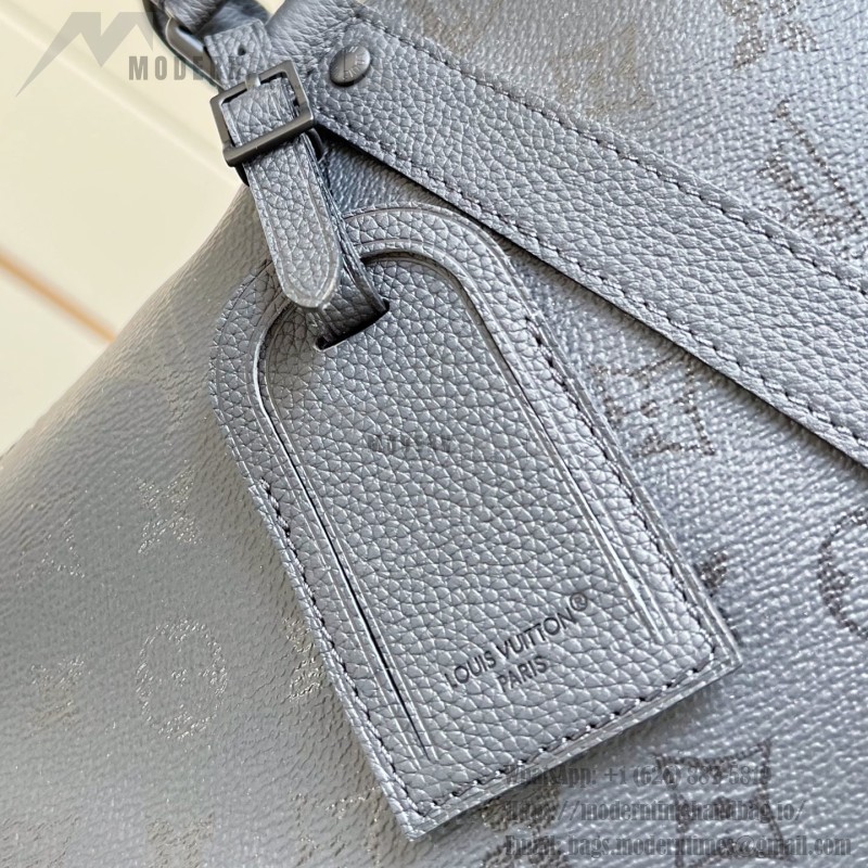 Louis Vuitton Keepall Bandoulière 45 travel bag in Monogram Midnight coated canvas with leather trim