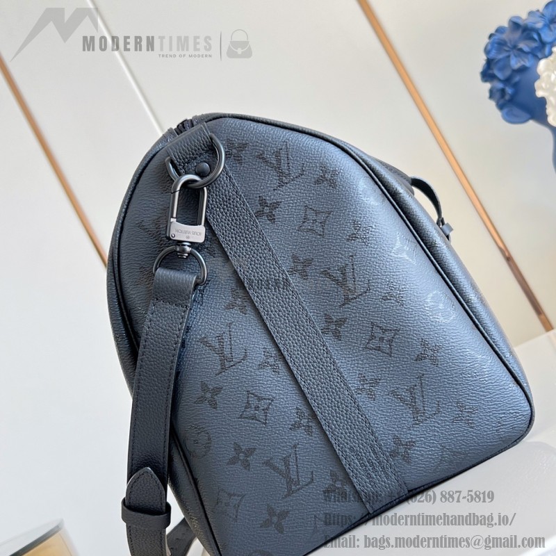 Louis Vuitton Keepall Bandoulière 45 travel bag in Monogram Midnight coated canvas with leather trim