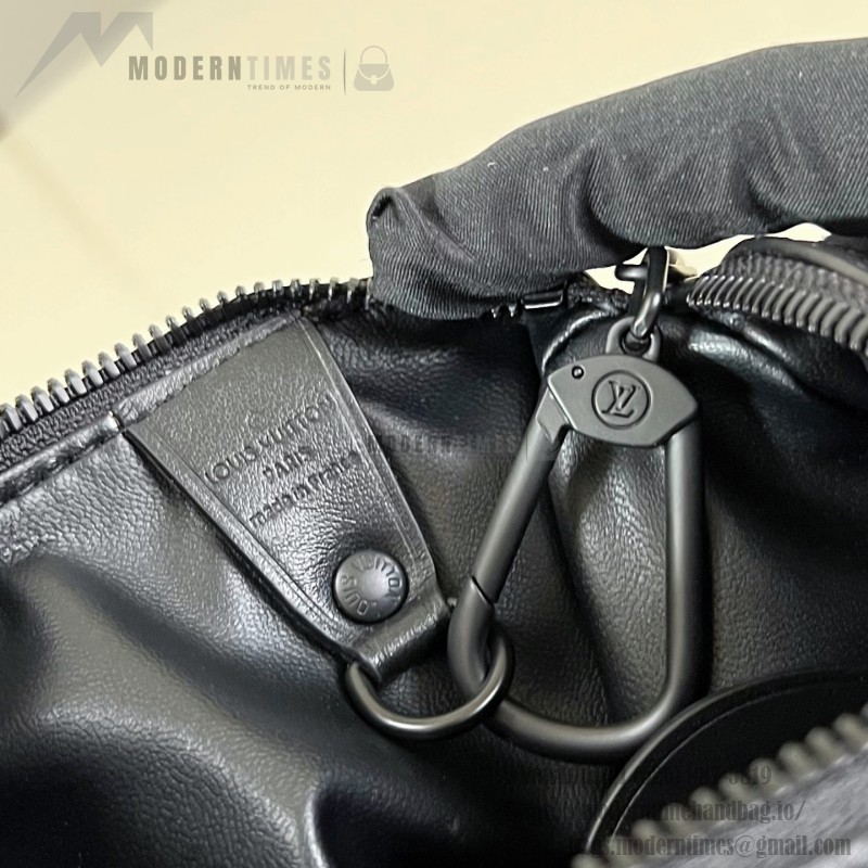 Louis Vuitton-inspired Speedy P9 Bandoulière 20 replica handbag in black silver and orange glossy leather style