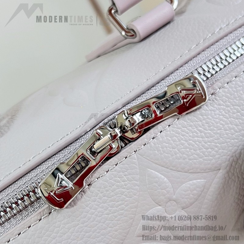 Louis Vuitton-inspired Speedy Bandoulière 20 replica handbag in Monogram Empreinte-style embossed grained leather
