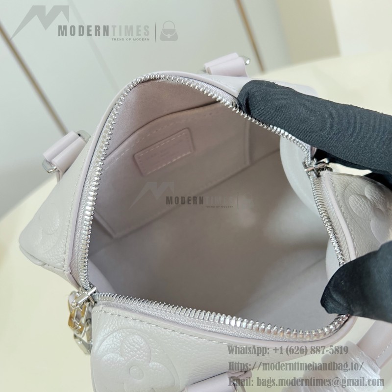 Louis Vuitton-inspired Speedy Bandoulière 20 replica handbag in Monogram Empreinte-style embossed grained leather