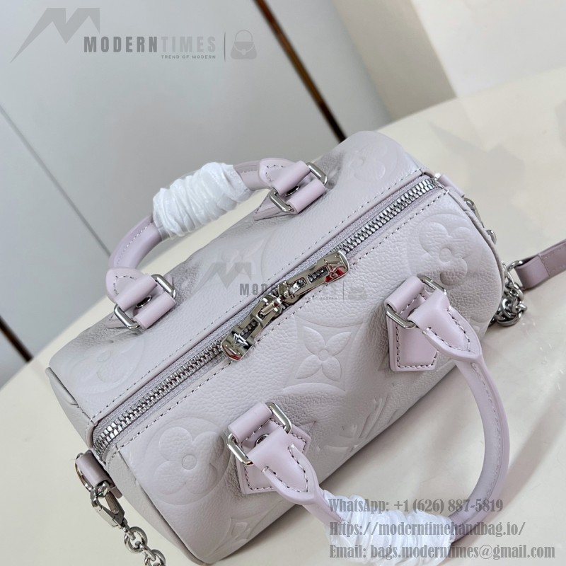 Louis Vuitton-inspired Speedy Bandoulière 20 replica handbag in Monogram Empreinte-style embossed grained leather
