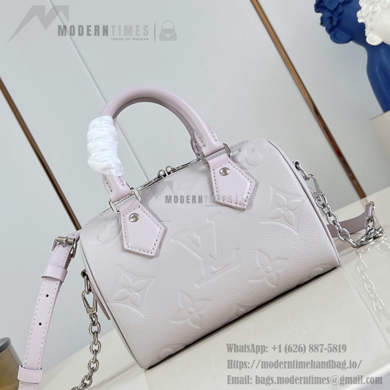 Louis Vuitton-inspired Speedy Bandoulière 20 replica handbag in Monogram Empreinte-style embossed grained leather
