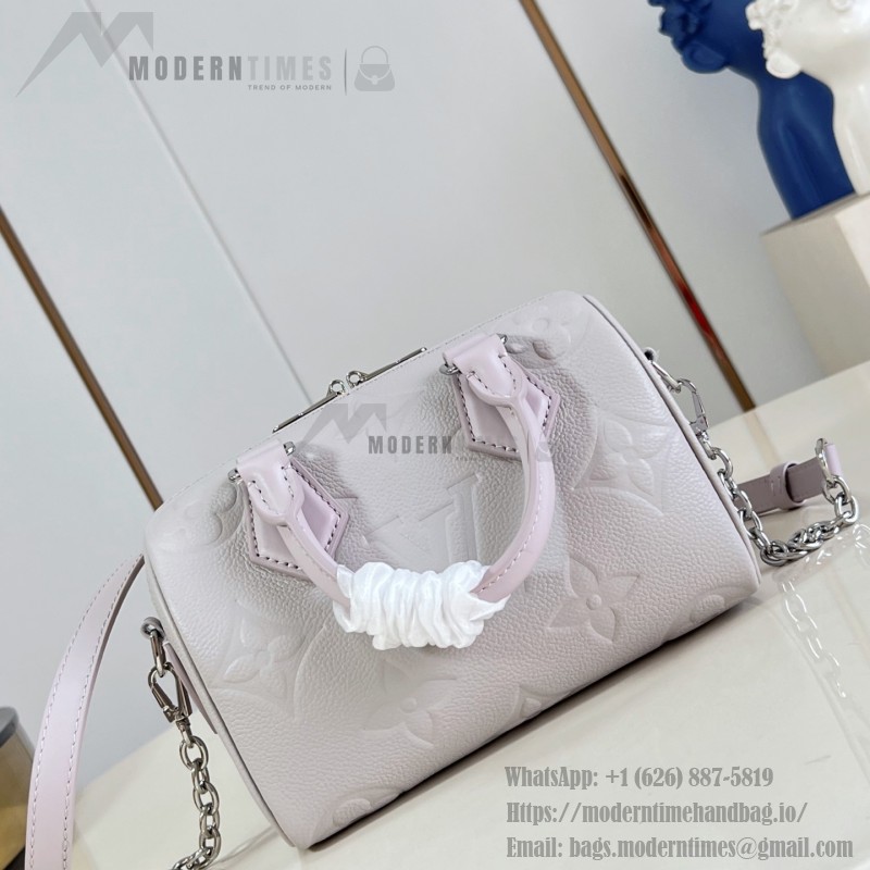 Louis Vuitton-inspired Speedy Bandoulière 20 replica handbag in Monogram Empreinte-style embossed grained leather