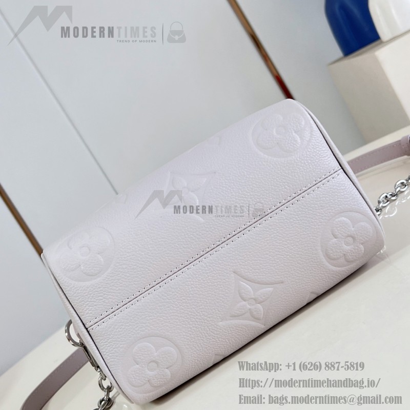 Louis Vuitton-inspired Speedy Bandoulière 20 replica handbag in Monogram Empreinte-style embossed grained leather