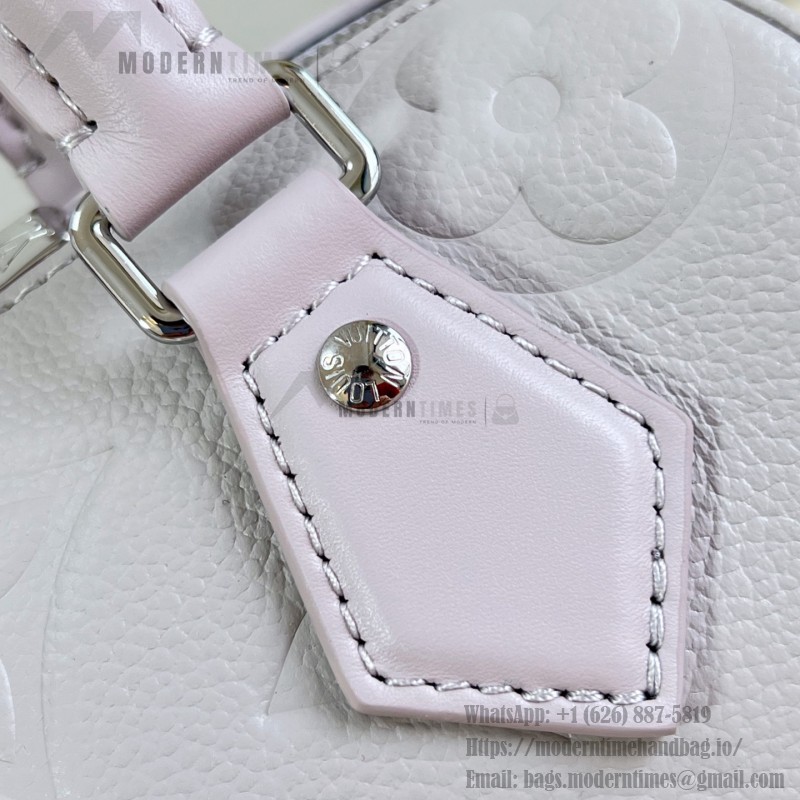Louis Vuitton-inspired Speedy Bandoulière 20 replica handbag in Monogram Empreinte-style embossed grained leather