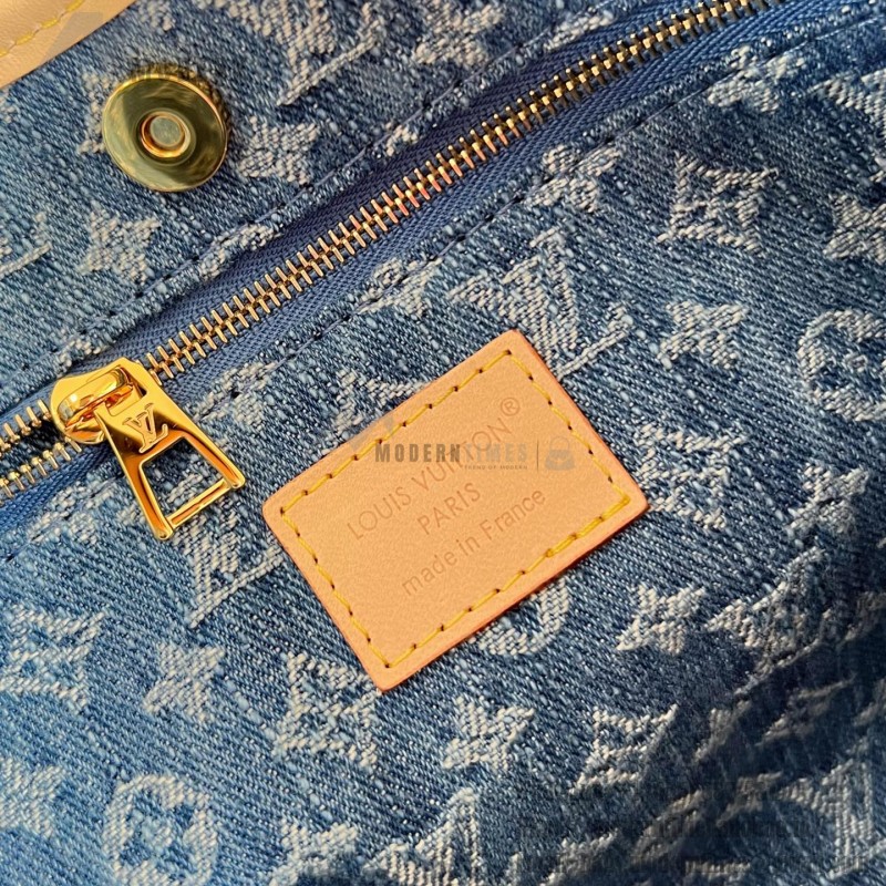 Louis Vuitton CarryAll Cargo PM Denim Rendez-Vous handbag in blue and military green denim with leather trim and luggage tag