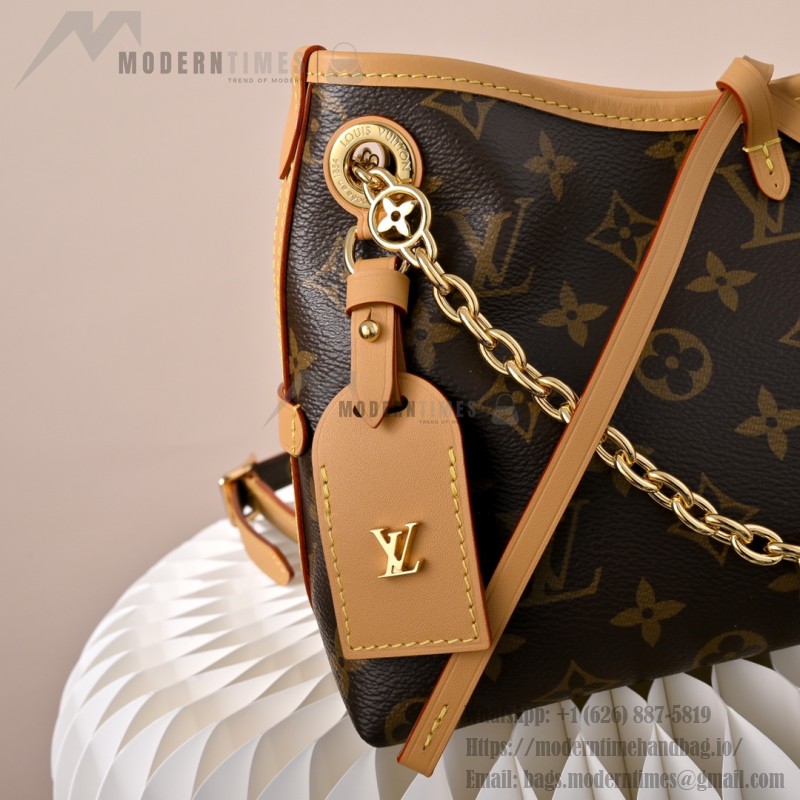  Louis Vuitton CarryAll BB Monogram vintage handbag M13014 with decorative chain leather luggage tag and drawstring closure