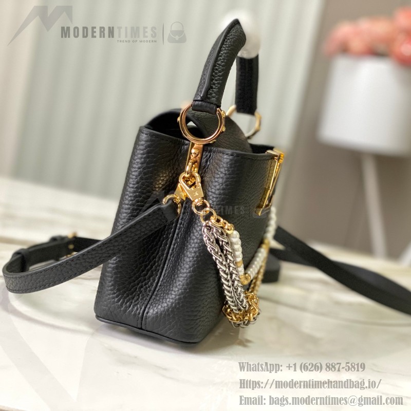Louis Vuitton Capucines East-West Why Knot Taurillon leather handbag in mini and small sizes with Monogram beaded chain and shiny metal hardware
