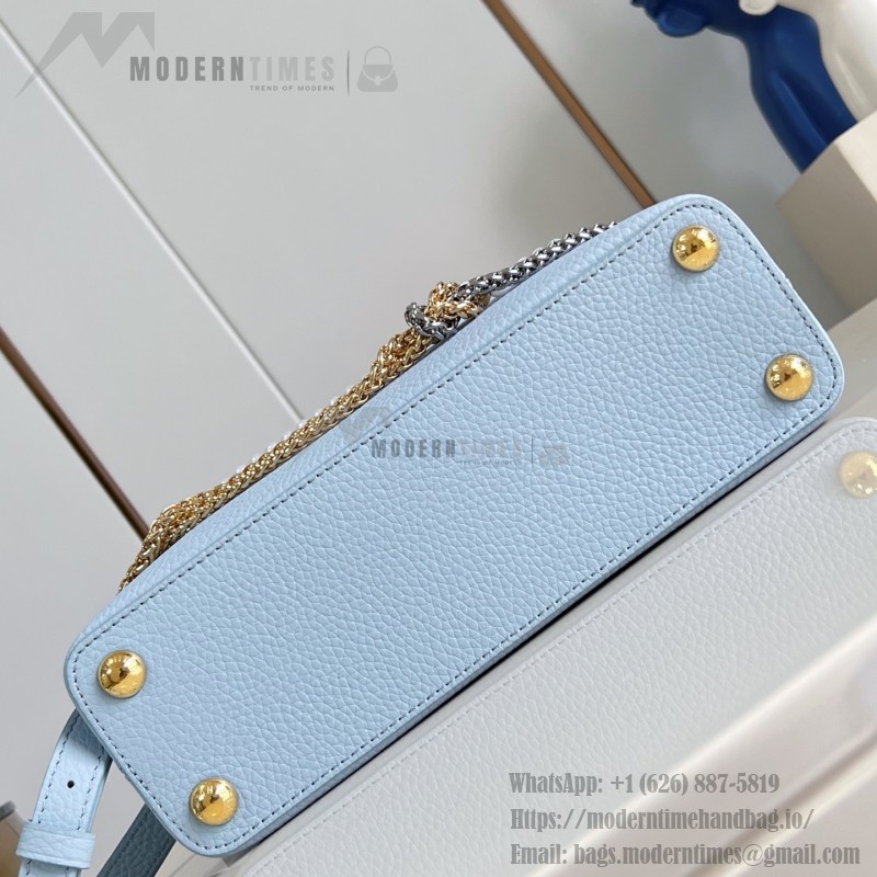 Louis Vuitton Capucines East-West Why Knot Taurillon leather handbag in mini and small sizes with Monogram beaded chain and shiny metal hardware