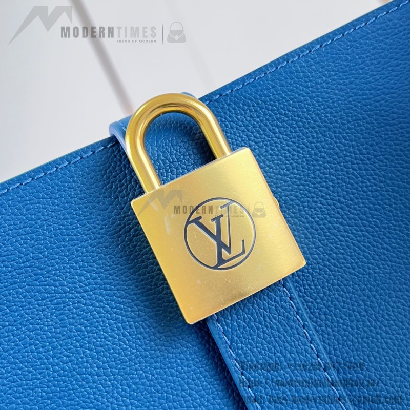Louis Vuitton Low Key Cabas MM M25341 sky blue leather tote bag with padlock detail and adjustable handles
