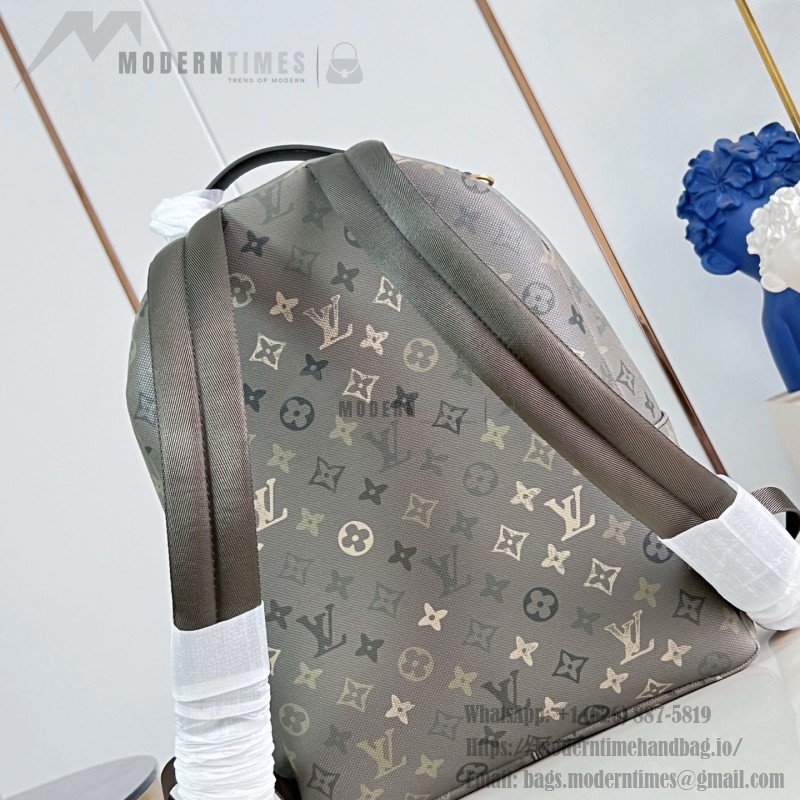 Louis Vuitton Discovery PM M29769 Monogram Surplus backpack with leather trim and front zip pocket