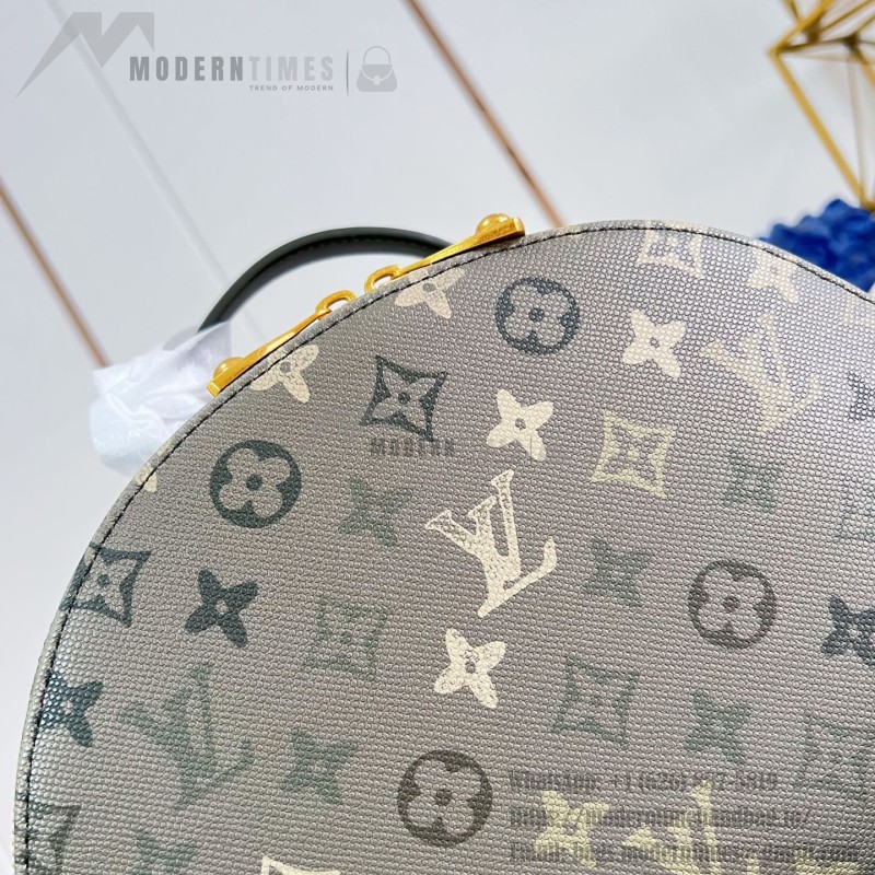 Louis Vuitton Discovery PM M29769 Monogram Surplus backpack with leather trim and front zip pocket