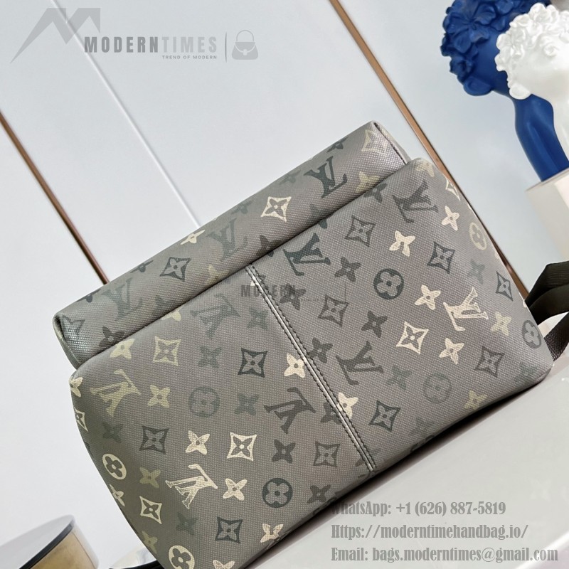 Louis Vuitton Discovery PM M29769 Monogram Surplus backpack with leather trim and front zip pocket