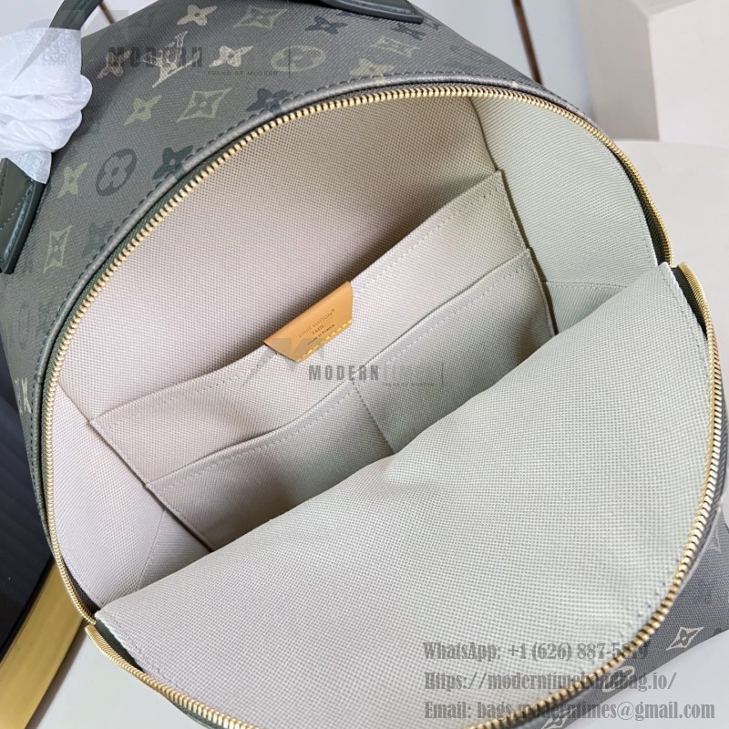 Louis Vuitton Discovery PM M29769 Monogram Surplus backpack with leather trim and front zip pocket