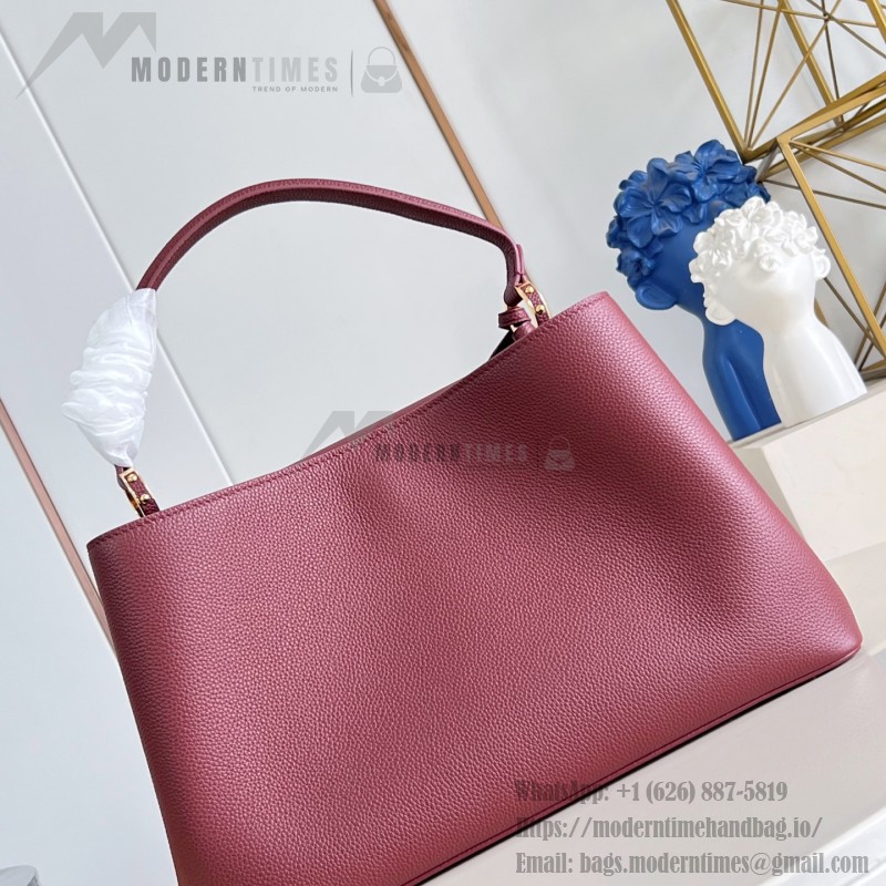 Louis Vuitton Capucines Souple Large M26259 smooth leather handbag with top handles and removable shoulder strap
