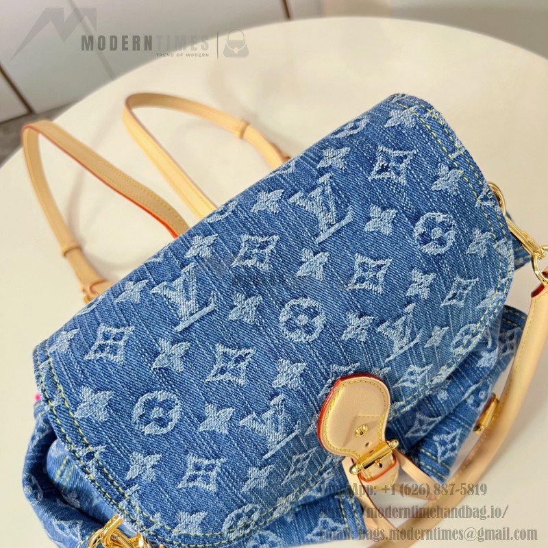 Louis Vuitton Montsouris Cargo M27330 Denim Rendez-Vous backpack with leather trim and braided charm