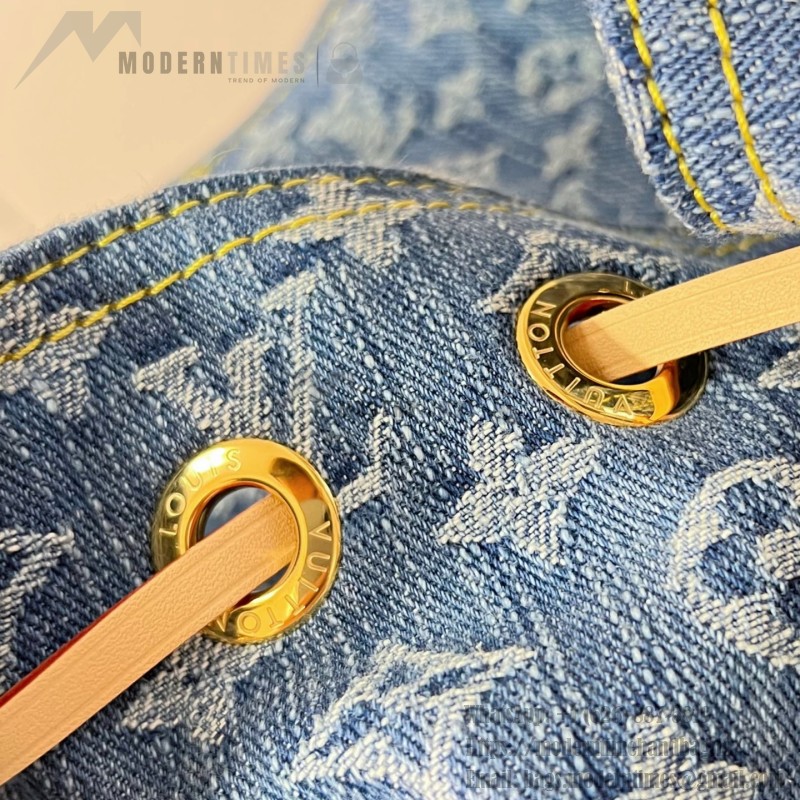 Louis Vuitton Montsouris Cargo M27330 Denim Rendez-Vous backpack with leather trim and braided charm