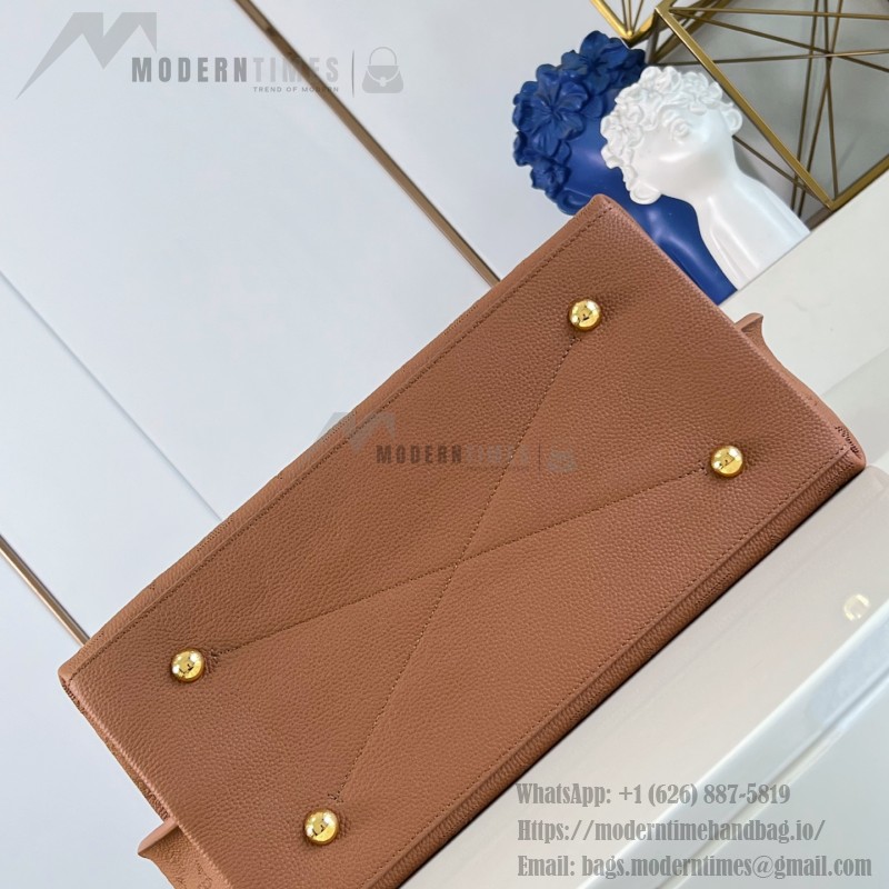 Louis Vuitton Carmel Hobo M27446 Taurillon grained leather shoulder bag with perforated leather and twist-lock closure