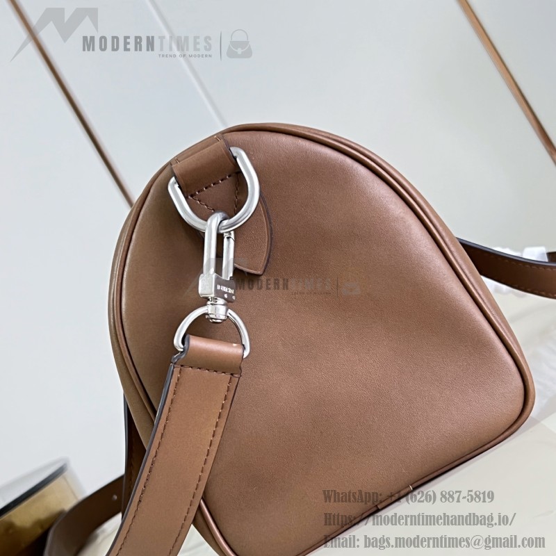 Louis Vuitton Needle M28000 Monogram canvas handbag with leather side bands and top handle
