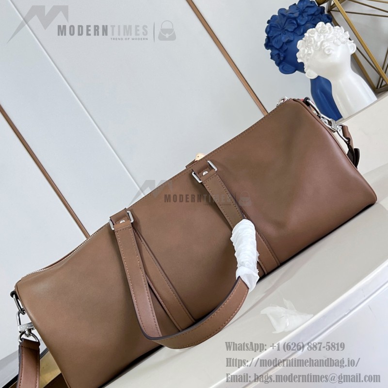 Louis Vuitton Needle M28000 Monogram canvas handbag with leather side bands and top handle