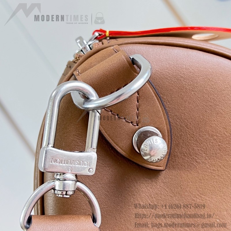 Louis Vuitton Needle M28000 Monogram canvas handbag with leather side bands and top handle