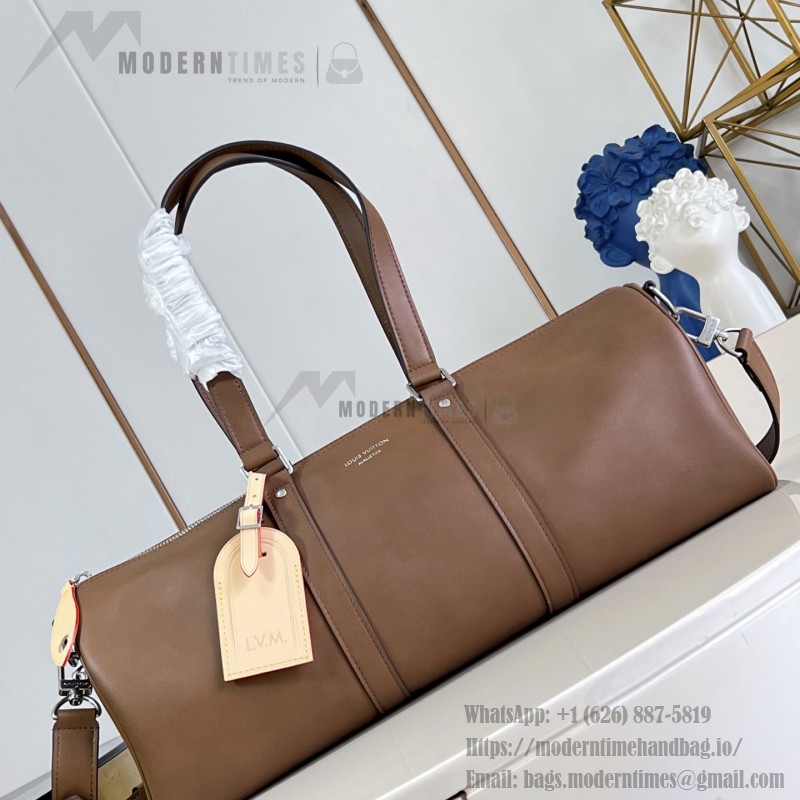 Louis Vuitton Needle M28000 Monogram canvas handbag with leather side bands and top handle