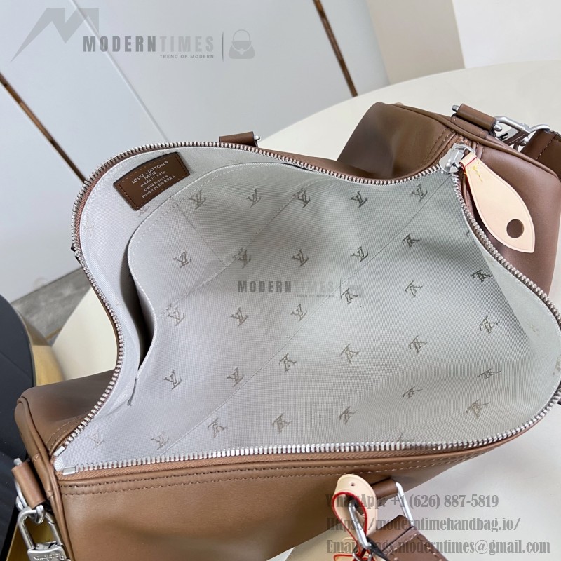 Louis Vuitton Needle M28000 Monogram canvas handbag with leather side bands and top handle