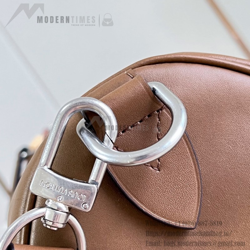 Louis Vuitton Needle M28000 Monogram canvas handbag with leather side bands and top handle