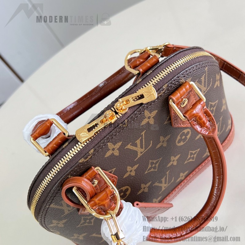 Louis Vuitton Alma BB M53152 Monogram canvas handbag with crocodile-embossed leather trim, Toron handles, padlock, and adjustable shoulder strap