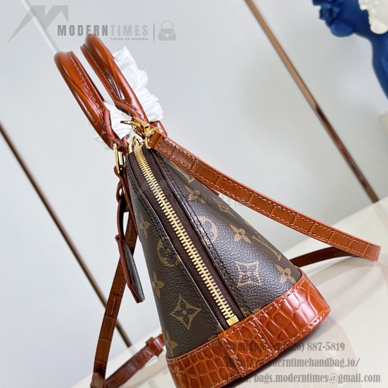 Louis Vuitton Alma BB M53152 Monogram canvas handbag with crocodile-embossed leather trim, Toron handles, padlock, and adjustable shoulder strap