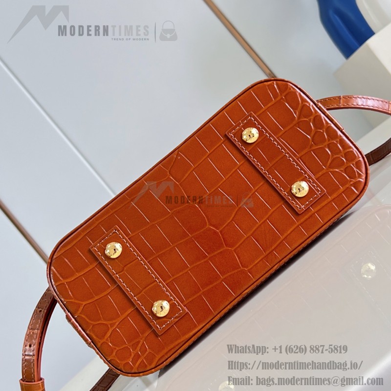 Louis Vuitton Alma BB M53152 Monogram canvas handbag with crocodile-embossed leather trim, Toron handles, padlock, and adjustable shoulder strap