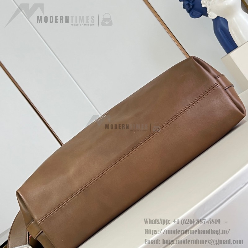 Louis Vuitton Vagabond Hobo M28392 soft tanned leather shoulder bag with an adjustable woven strap, padlock, and LV Blason jacquard lining