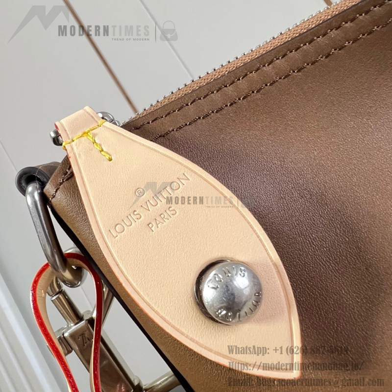 Louis Vuitton Vagabond Hobo M28392 soft tanned leather shoulder bag with an adjustable woven strap, padlock, and LV Blason jacquard lining
