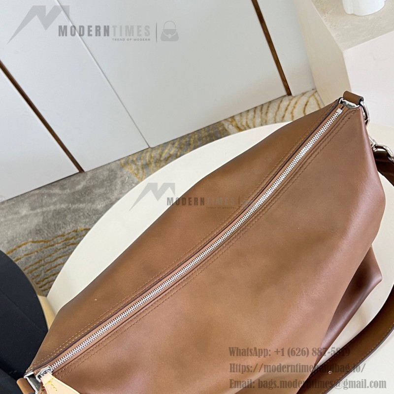 Louis Vuitton Vagabond Hobo M28392 soft tanned leather shoulder bag with an adjustable woven strap, padlock, and LV Blason jacquard lining
