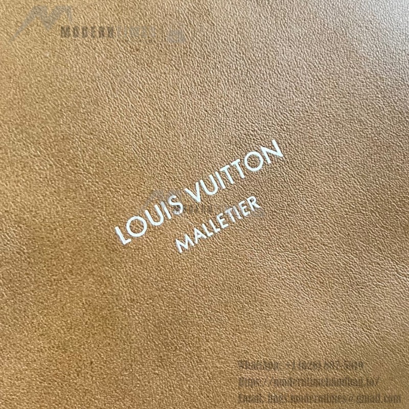 Louis Vuitton Vagabond Hobo M28392 soft tanned leather shoulder bag with an adjustable woven strap, padlock, and LV Blason jacquard lining