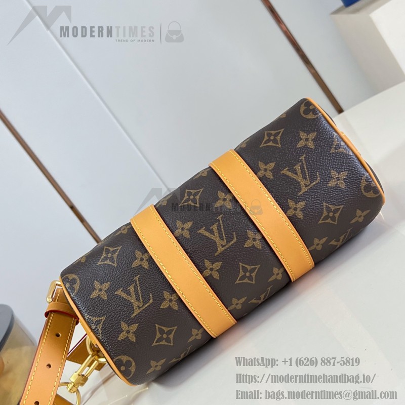Louis Vuitton Keepall Bandoulière 25 M28957 Monogram Archive coated canvas bag with cowhide leather trim, aged metal hardware, top handle, and adjustable strap