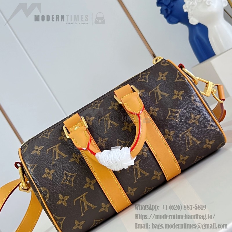 Louis Vuitton Keepall Bandoulière 25 M28957 Monogram Archive coated canvas bag with cowhide leather trim, aged metal hardware, top handle, and adjustable strap