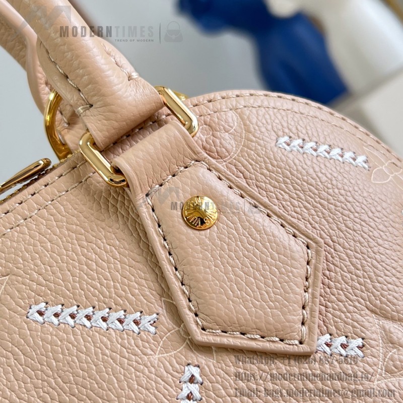 Louis Vuitton Alma BB M28458 Monogram Empreinte Couture Leather Handbag with Gold Padlock and Embroidered Finish