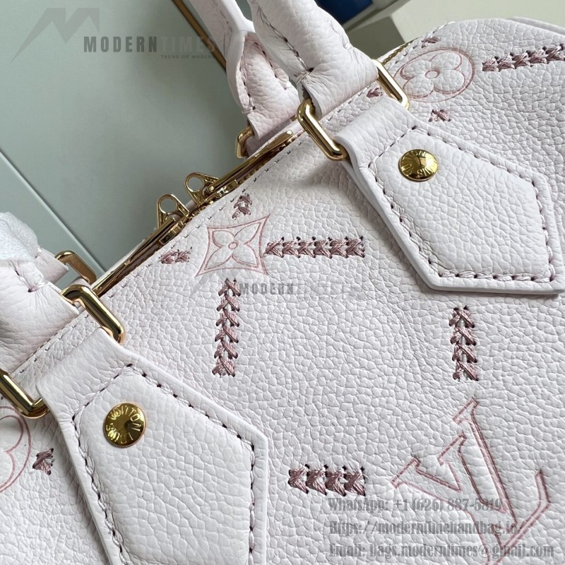 Louis Vuitton Speedy Bandoulière 20 M28529 Monogram Empreinte Couture Leather Handbag with LV Padlock and Decorative Chain