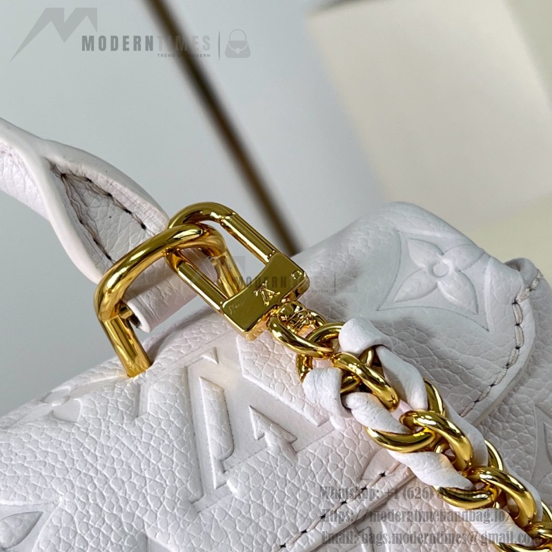 Louis Vuitton Nano Madeleine M29378 Monogram Empreinte leather handbag in Yellow and Purple