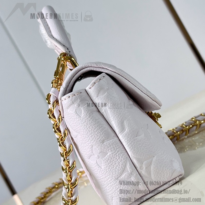 Louis Vuitton Nano Madeleine M29378 Monogram Empreinte leather handbag in Yellow and Purple